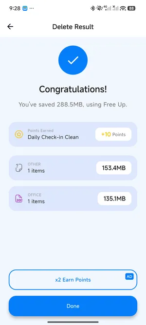 FreeUp Cleaner delete result screen showing saved storage and points earned
